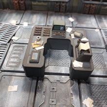 Load image into Gallery viewer, A miniature sci-fi control desk or console accessory, likely a tabletop terrain piece, shown on a detailed sci-fi floor background.