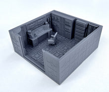 Load image into Gallery viewer, A gray miniature model of a futuristic control room or command center, featuring a detailed desk, chair, and wall-mounted panels, shown on a clean white background.