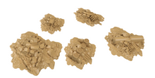 Load image into Gallery viewer, Five tan terrain pieces with detailed rubble and debris textures, arranged on a plain white background.