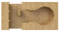 Load image into Gallery viewer, A top-down view of a wooden miniature terrain piece, likely a stone or wood-textured tabletop map section, featuring a large circular chamber with carved concentric circles and a smaller rectangular room with carved panel details.